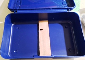STEP 4: Cut another piece of shim to fit the width of the box.